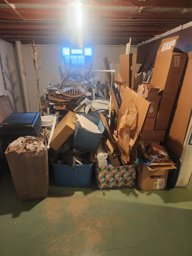 Roll-off dumpster container at job site for 20 Yard Dumpster Rental in Lemay